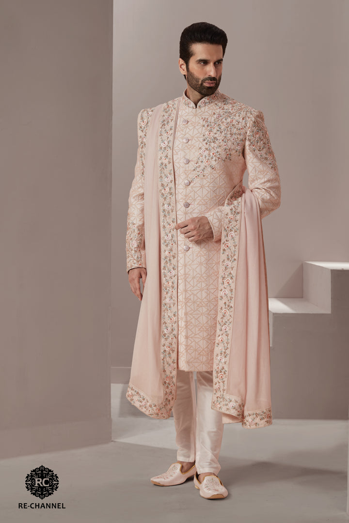 Light Pink Silk Sherwani with Geometric base & Floral Placement.