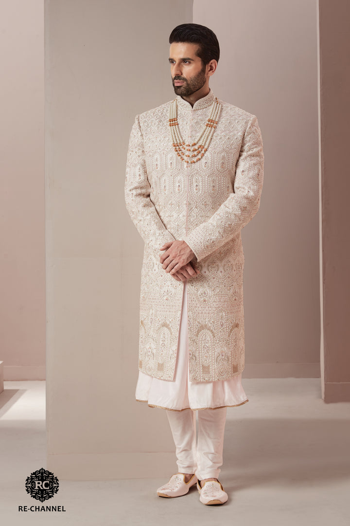 Light Pink Silk Sherwani in Symmetric & Floral Motifs