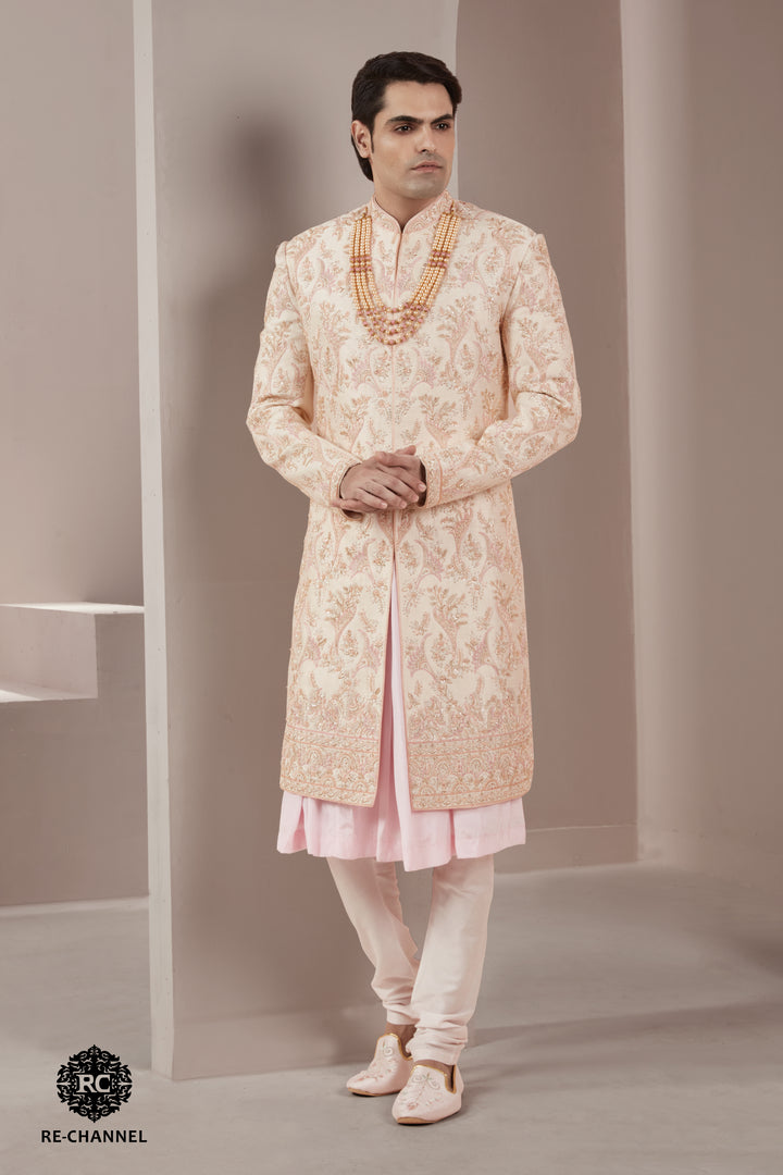 Light Peach Silk Sherwani with Intricate Floral Motifs.