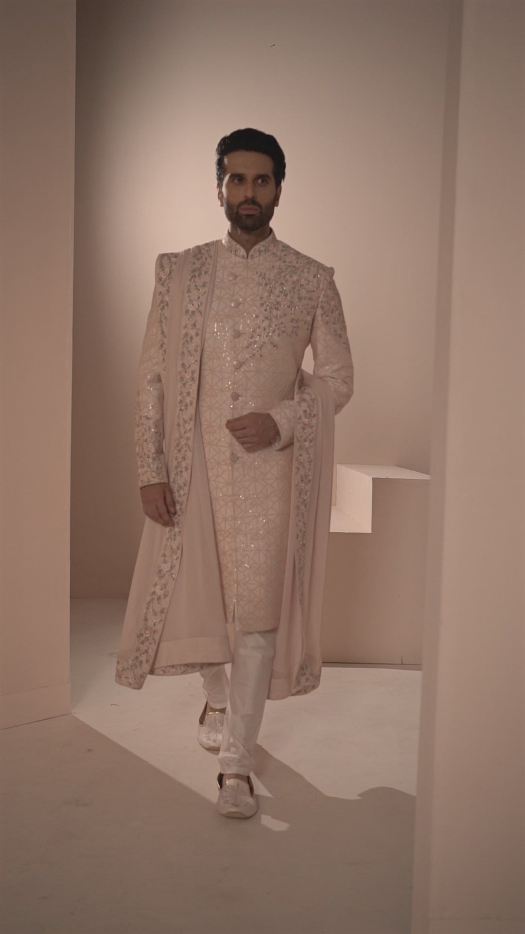 Light Pink Silk Sherwani with Geometric base & Floral Placement.