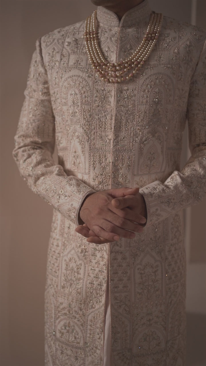 Powder Pink Silk Sherwani in Floral & Dome Motifs