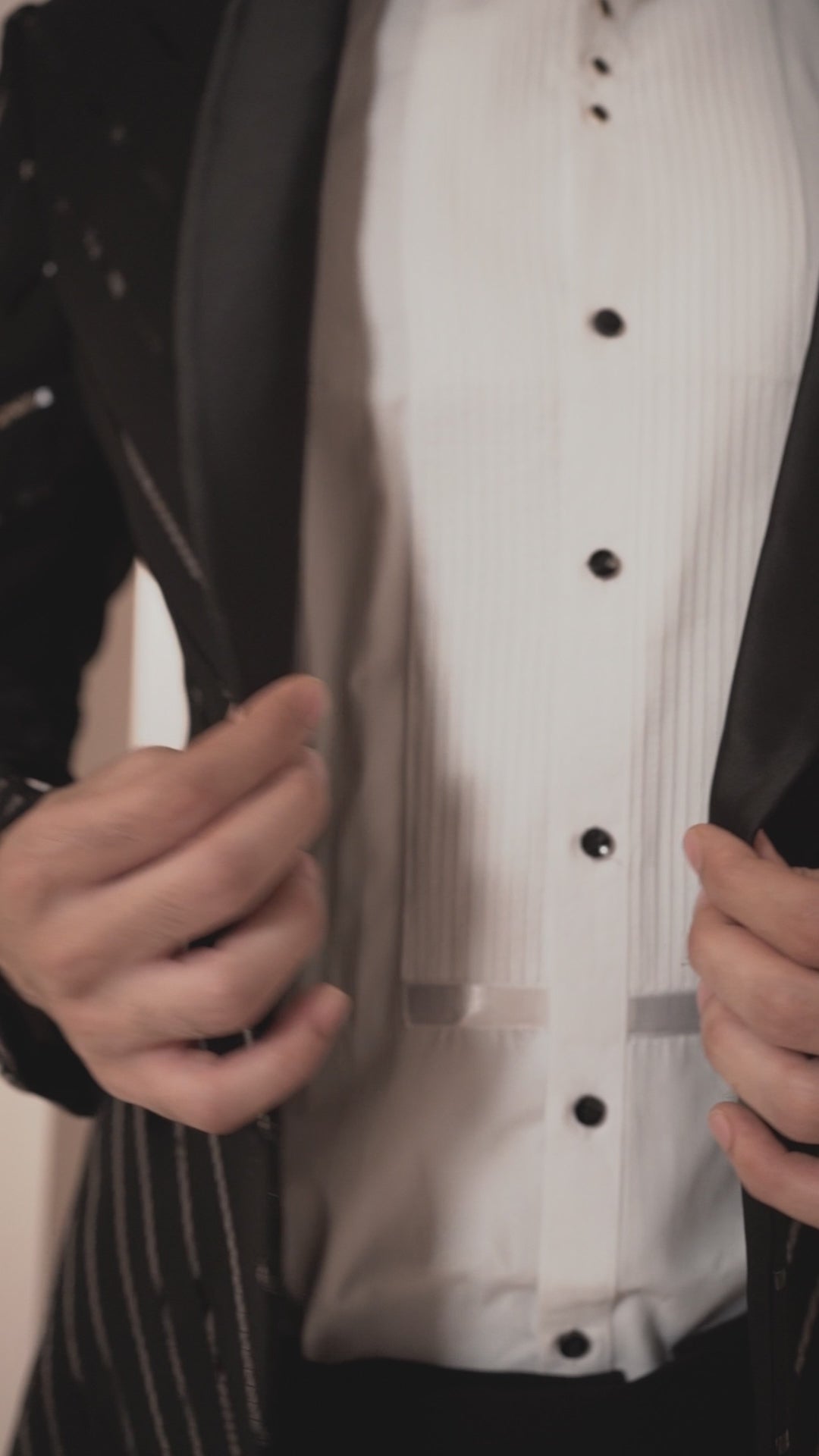 Black Suit in Chrome Detailing