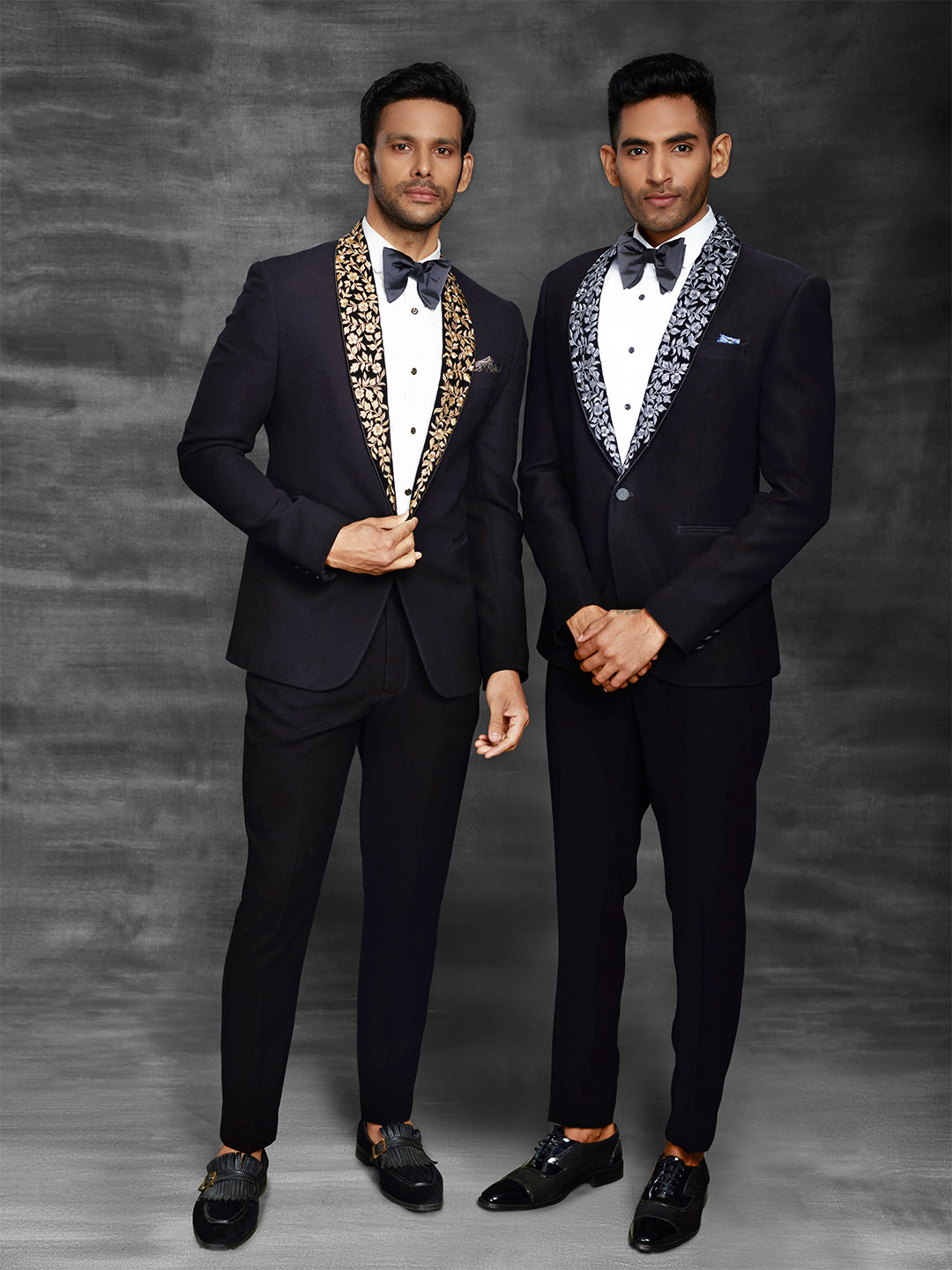 Black suit with stylish lapel.