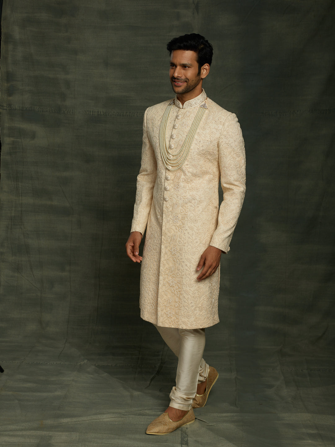 sherwani in gold