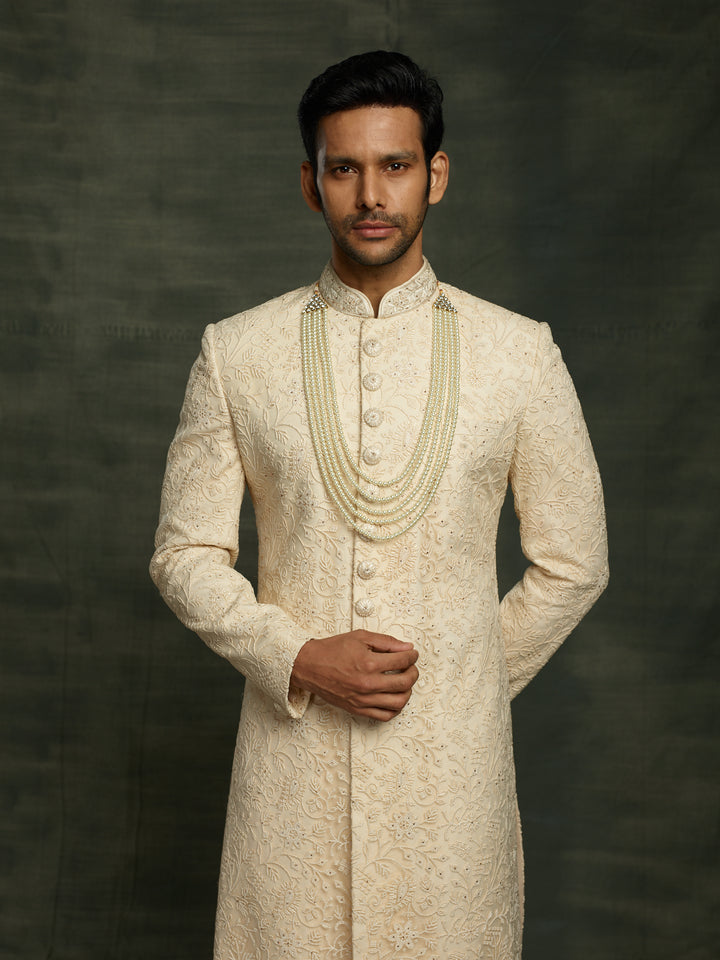 sherwani in gold