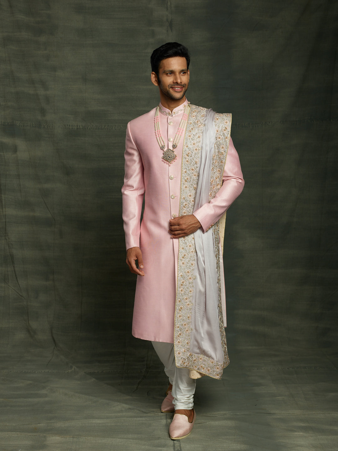 Raw silk sherwani with dupatta.