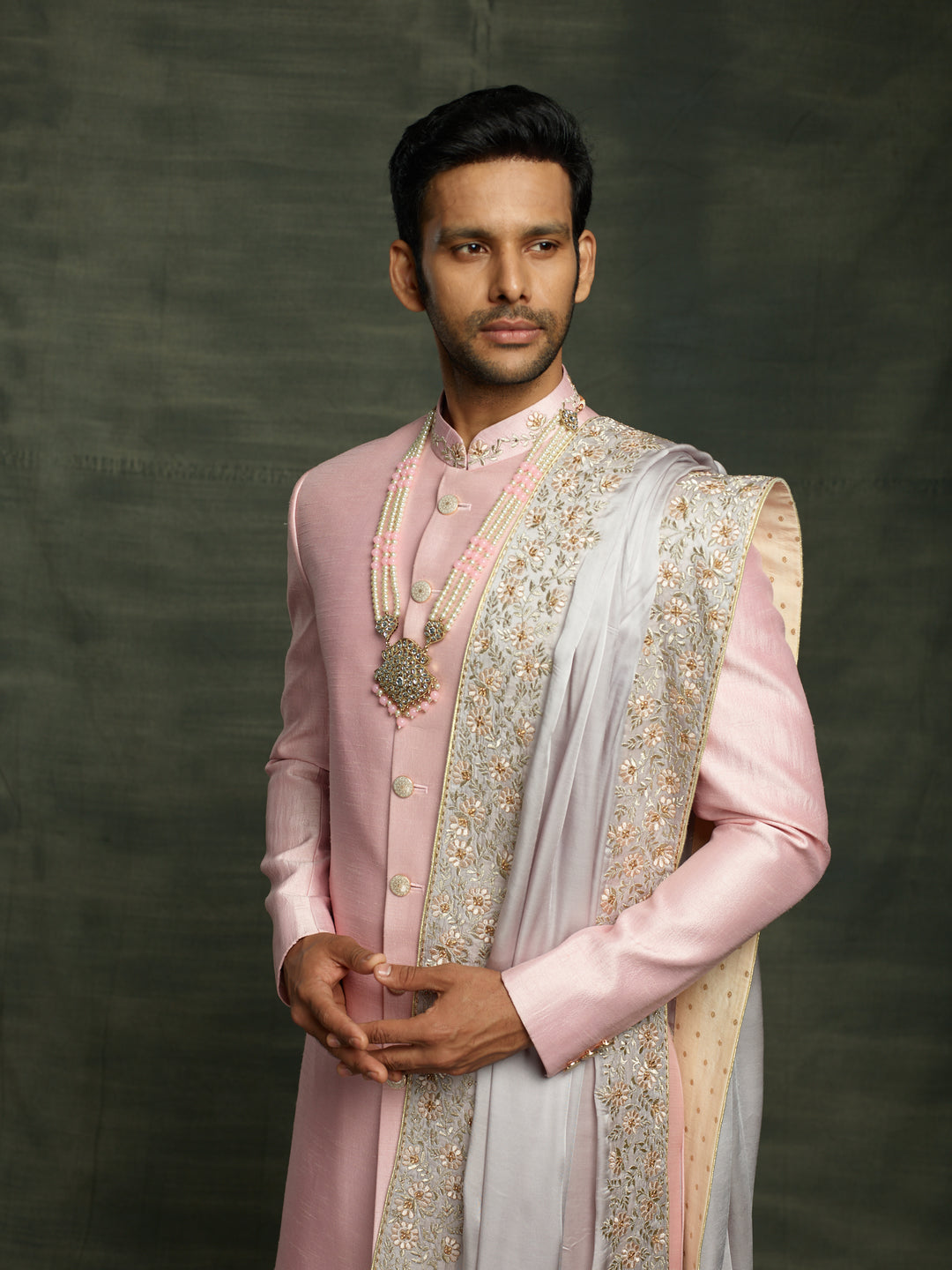 Raw silk sherwani with dupatta.