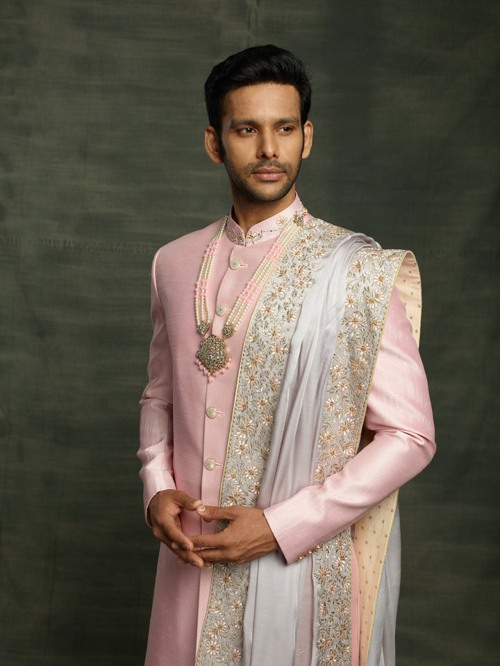 Raw silk sherwani with dupatta.
