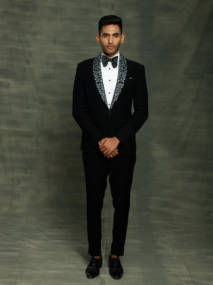 Black suit with stylish lapel.