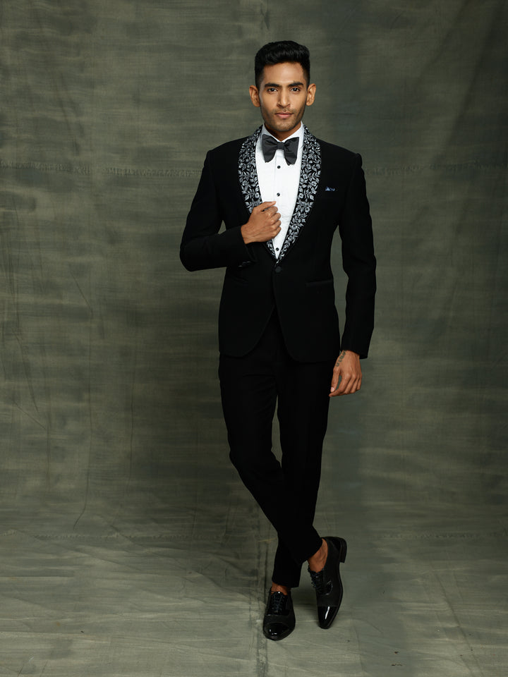 Black suit with stylish lapel.