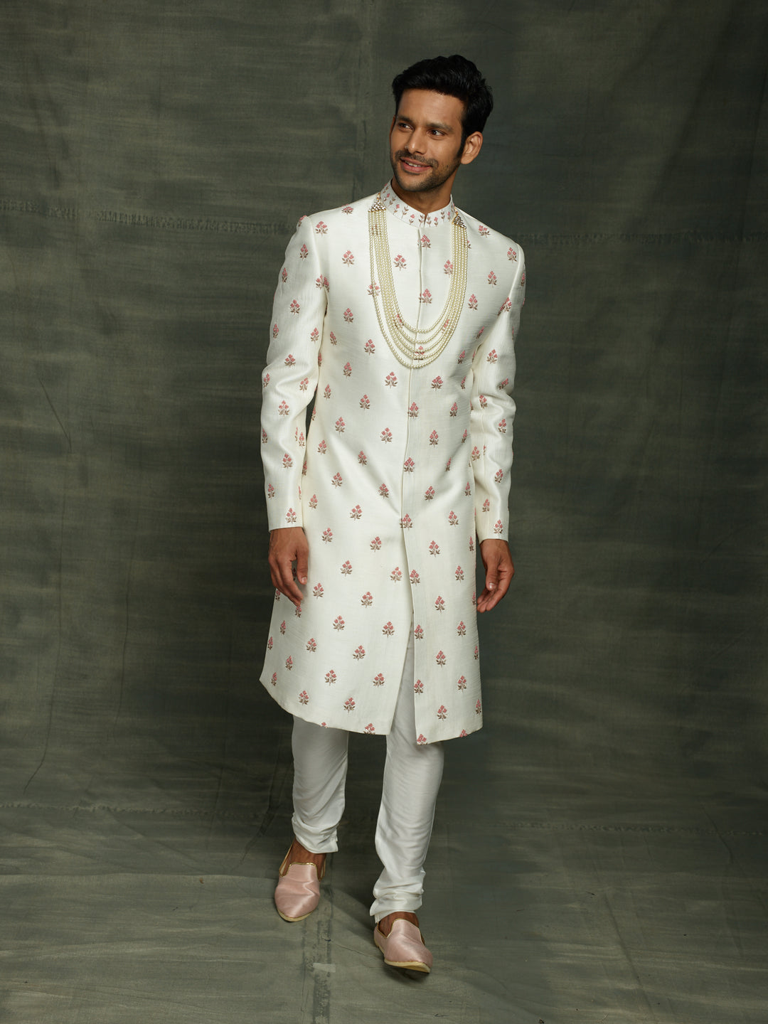 White sherwani with floral motifs