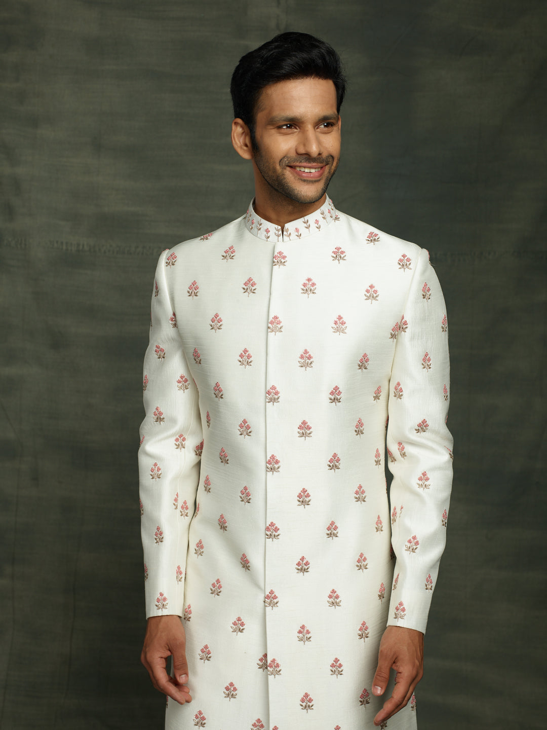 White sherwani with floral motifs