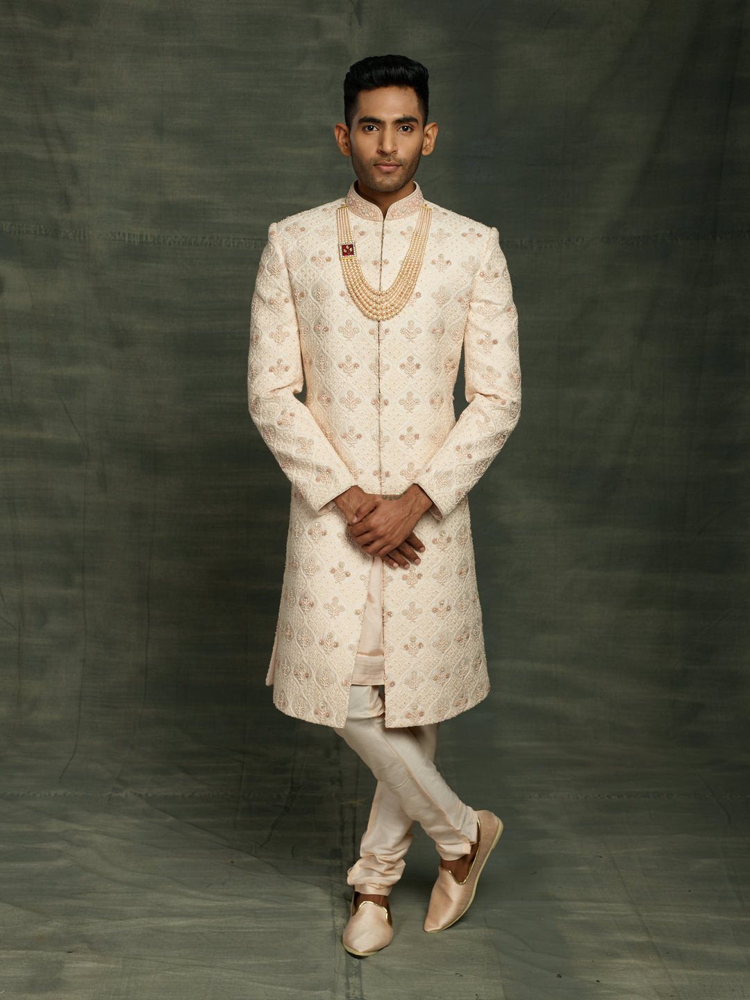 Lakhnavi groom's wear sherwani in peach