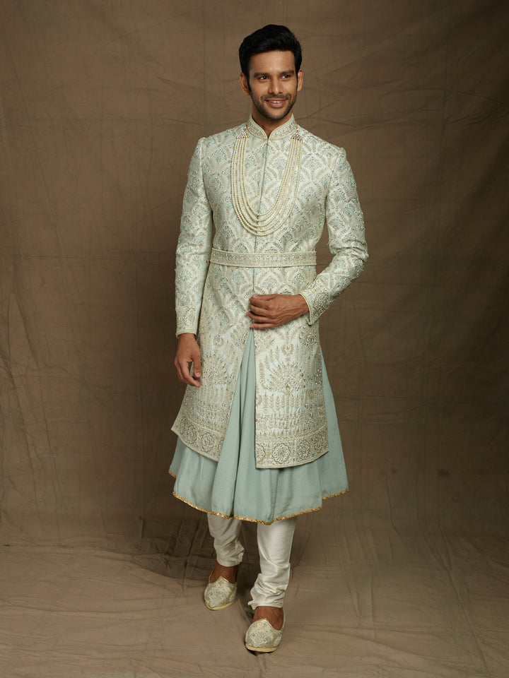 Mint-green color sherwani for groom.