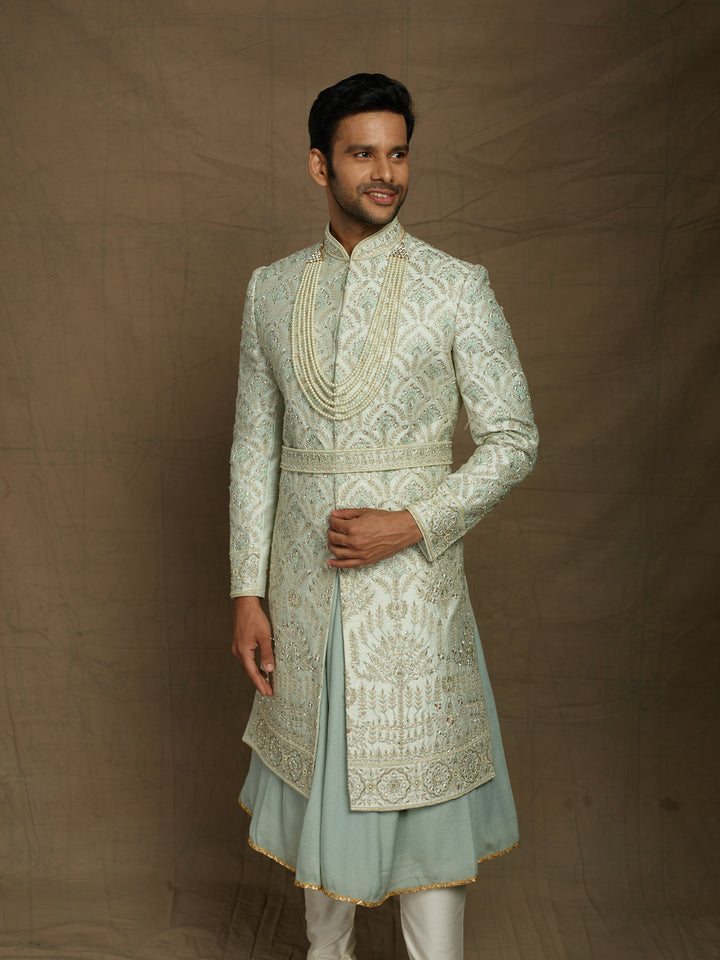 Mint-green color sherwani for groom.