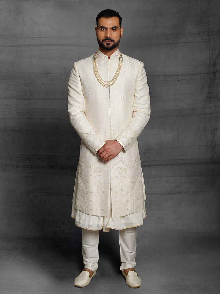 Off-white sherwani with elephant motif on daman