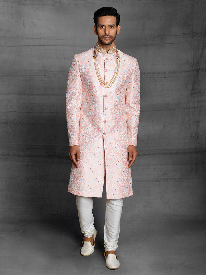 Simple silk sherwani with Resham embroidery.