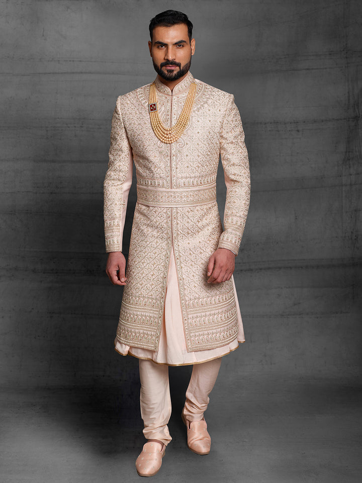 Heavy zardose sherwani with matching kamarbandh.