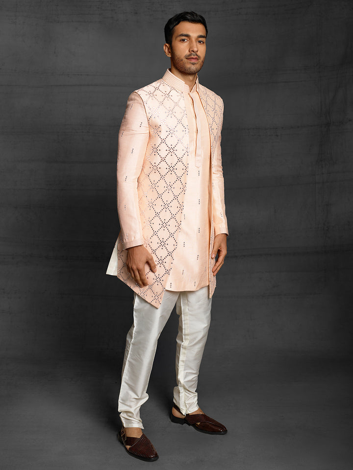 Peach kurta with sleeveless front open jacket.