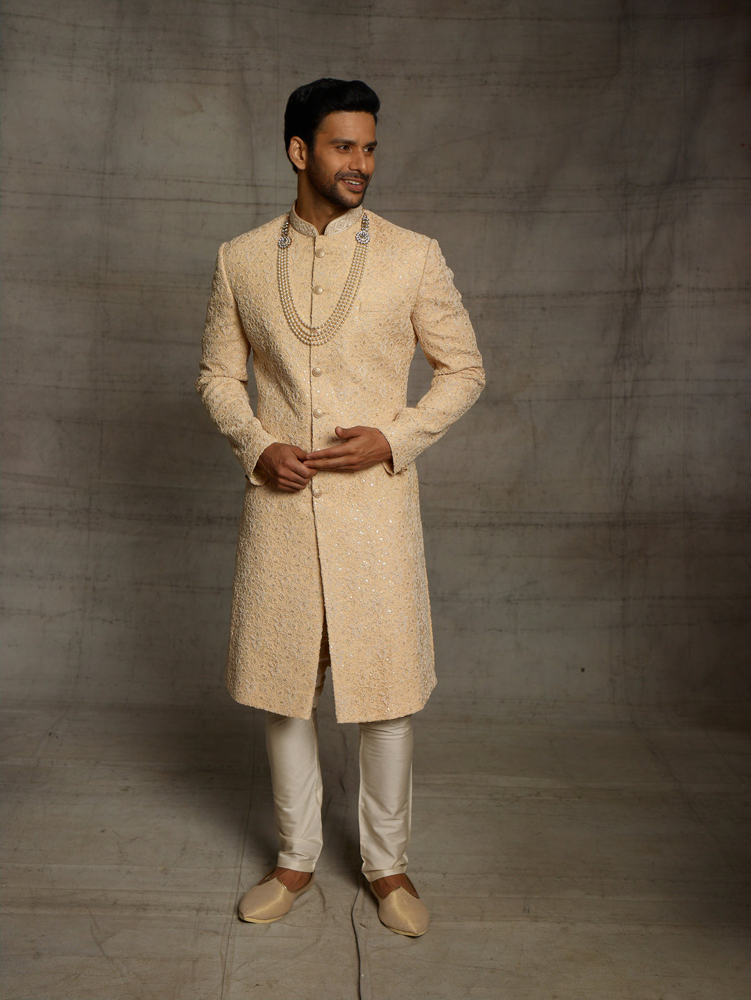Simple sherwani in gold color