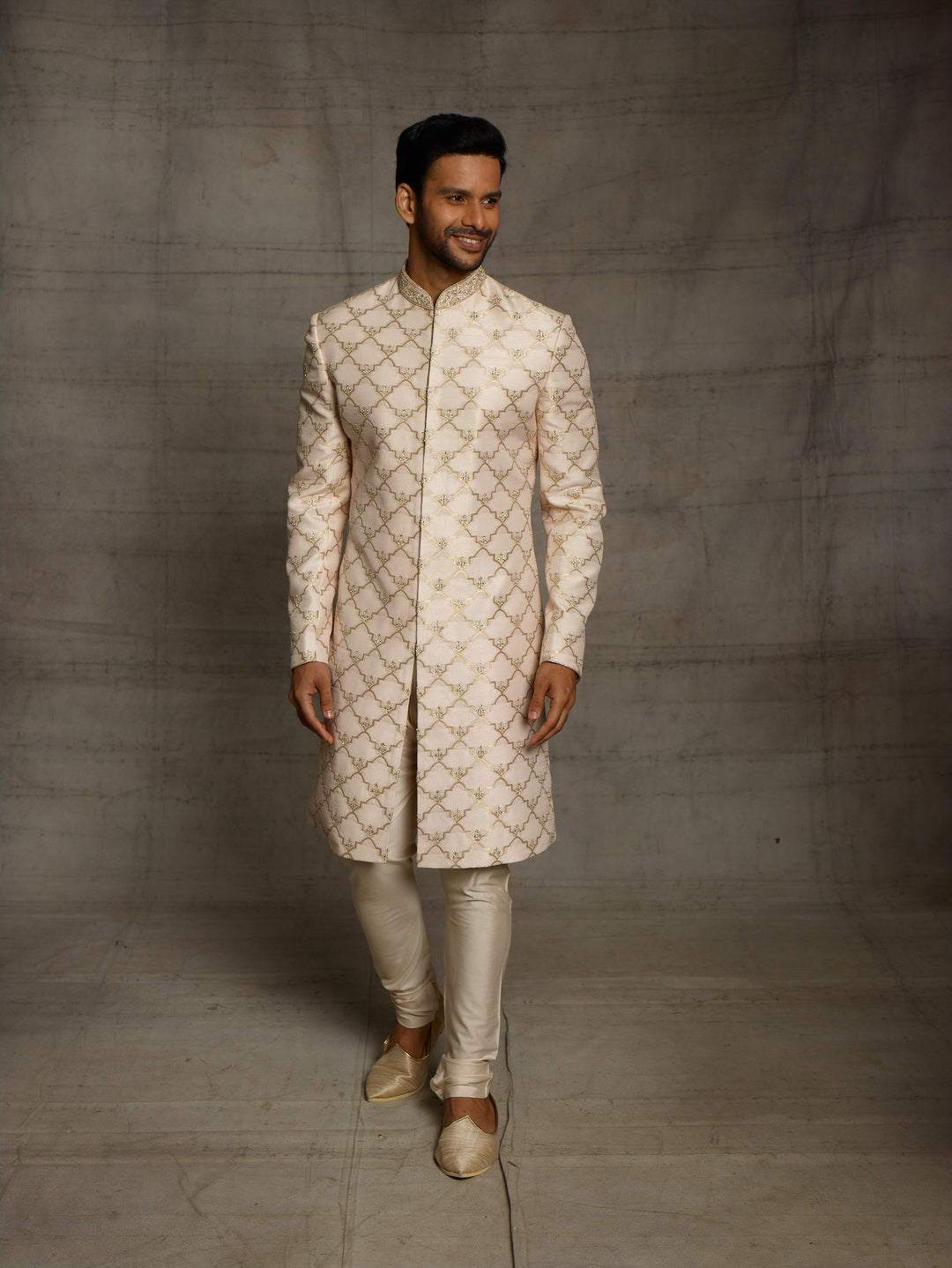 Brocade silk sherwani in gold