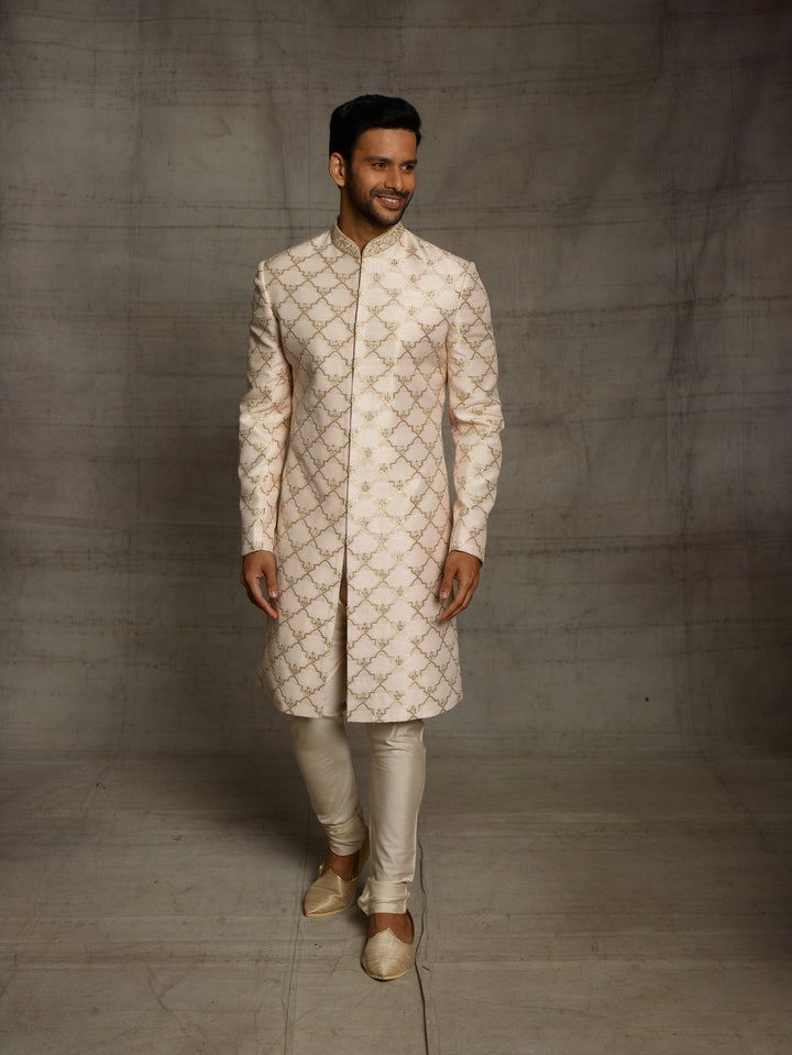 Brocade silk sherwani in gold