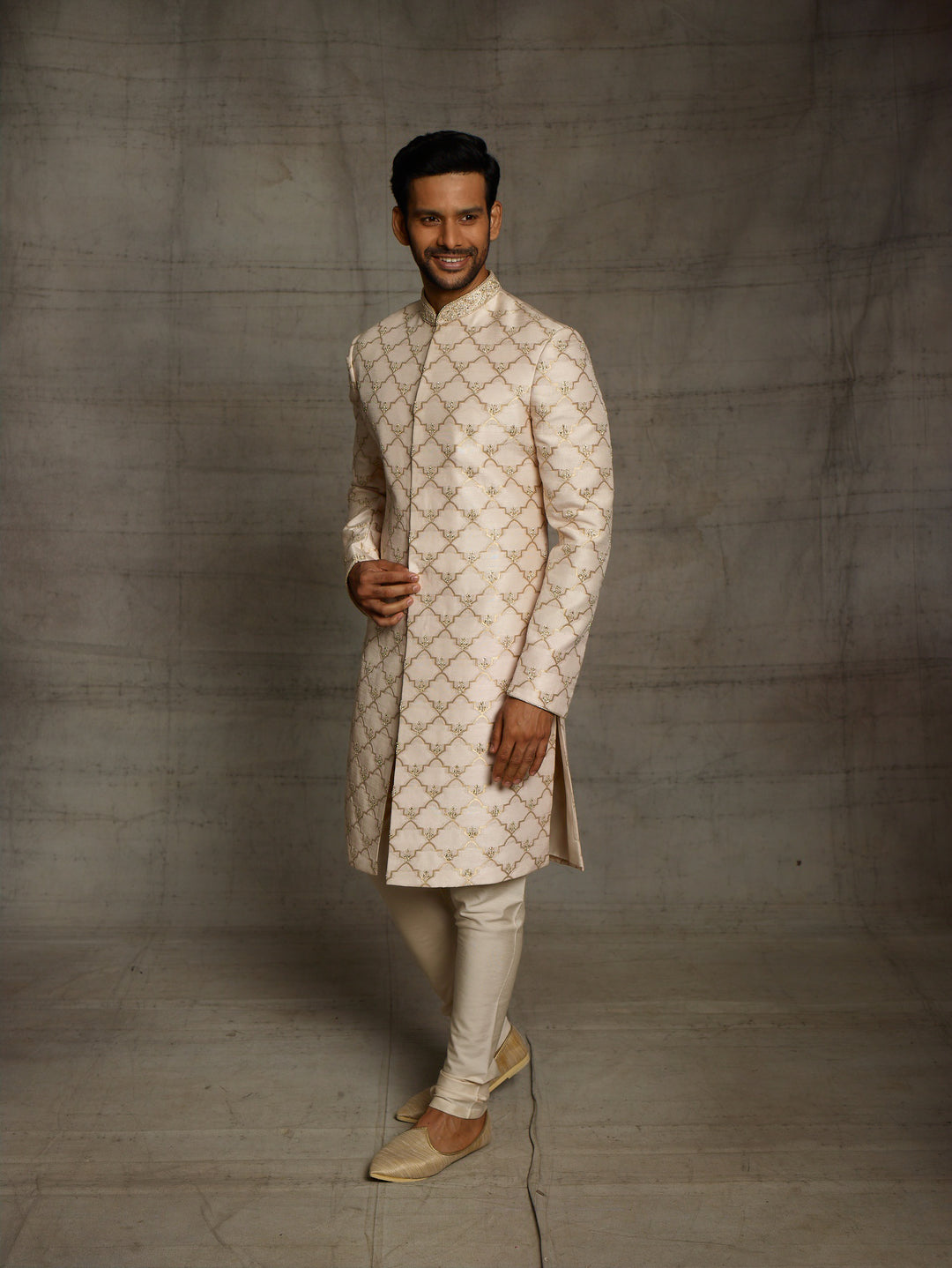 Brocade silk sherwani in gold