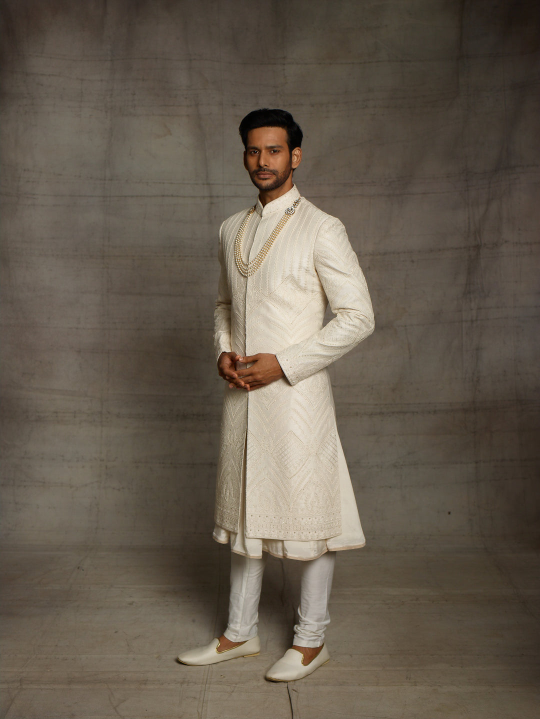 Off white sherwani with self color dori embroidery