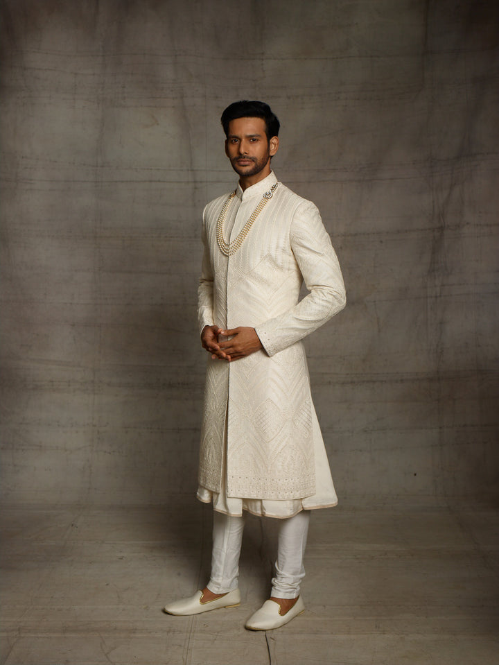 Off white sherwani with self color dori embroidery