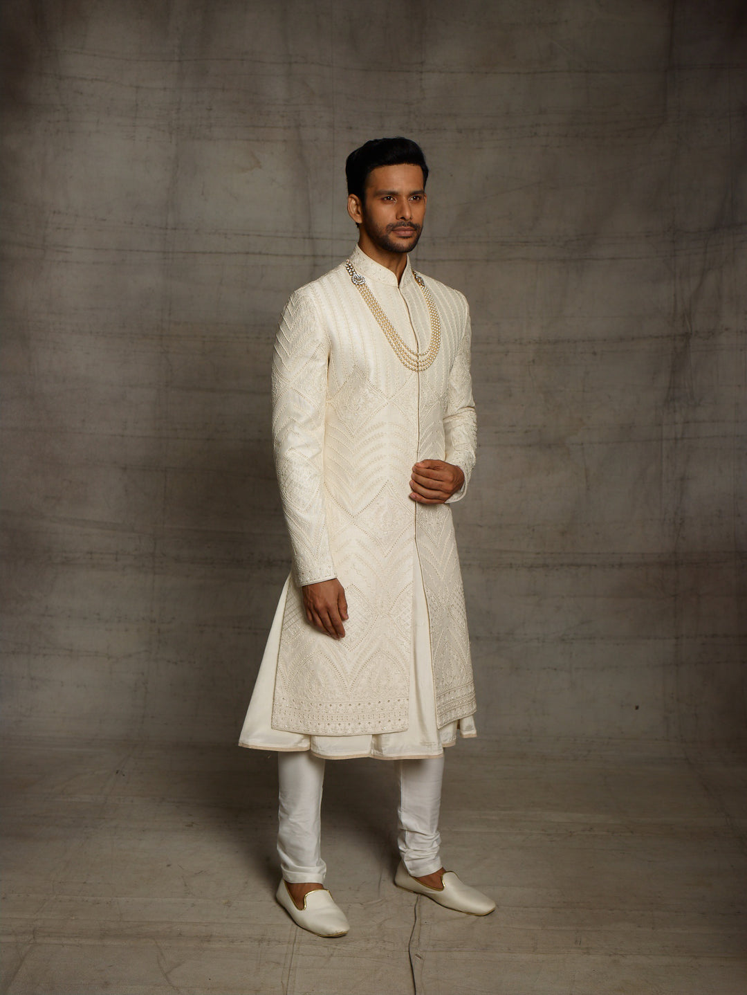 Off white sherwani with self color dori embroidery