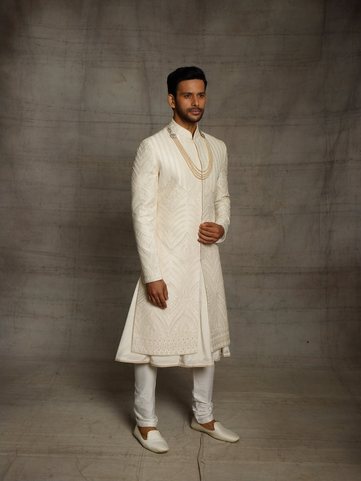 Off white sherwani with self color dori embroidery