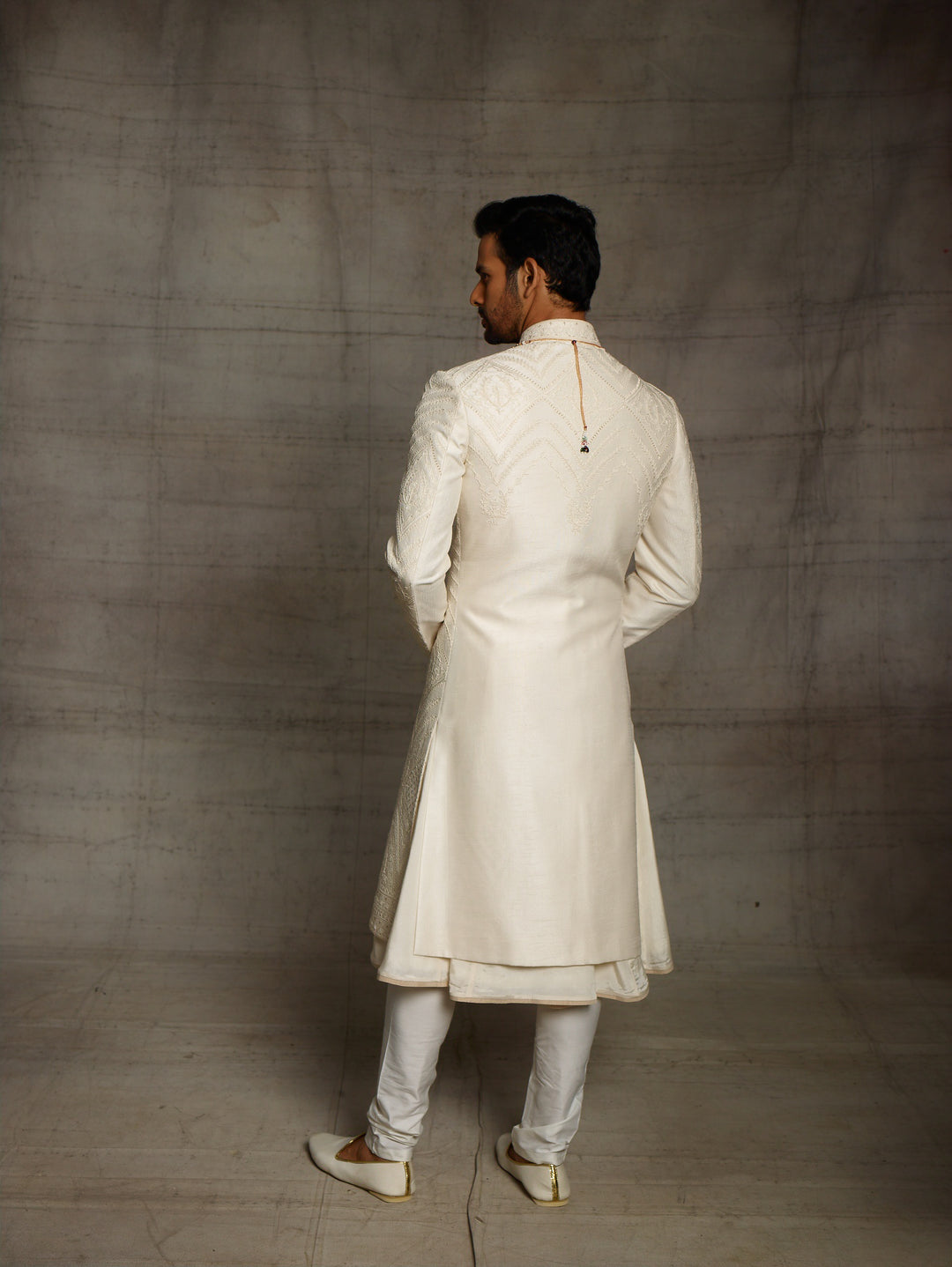 Off white sherwani with self color dori embroidery