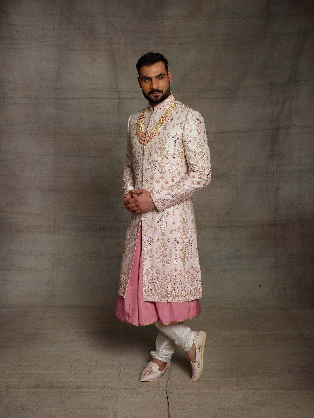 Pink-cream ombre grooms wear sherwani.