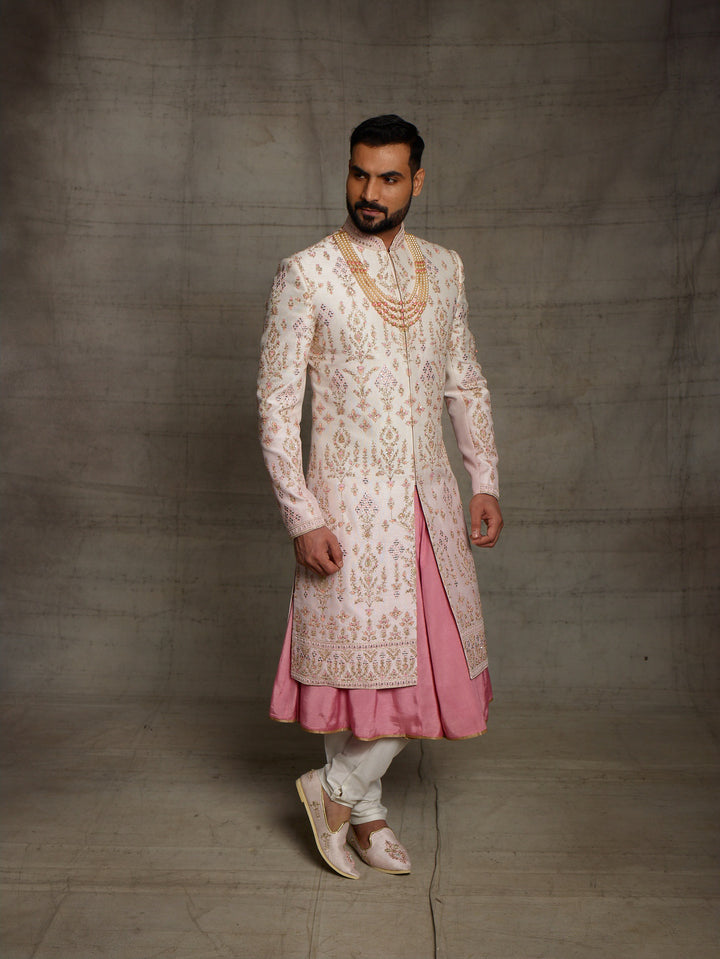 Pink-cream ombre grooms wear sherwani.