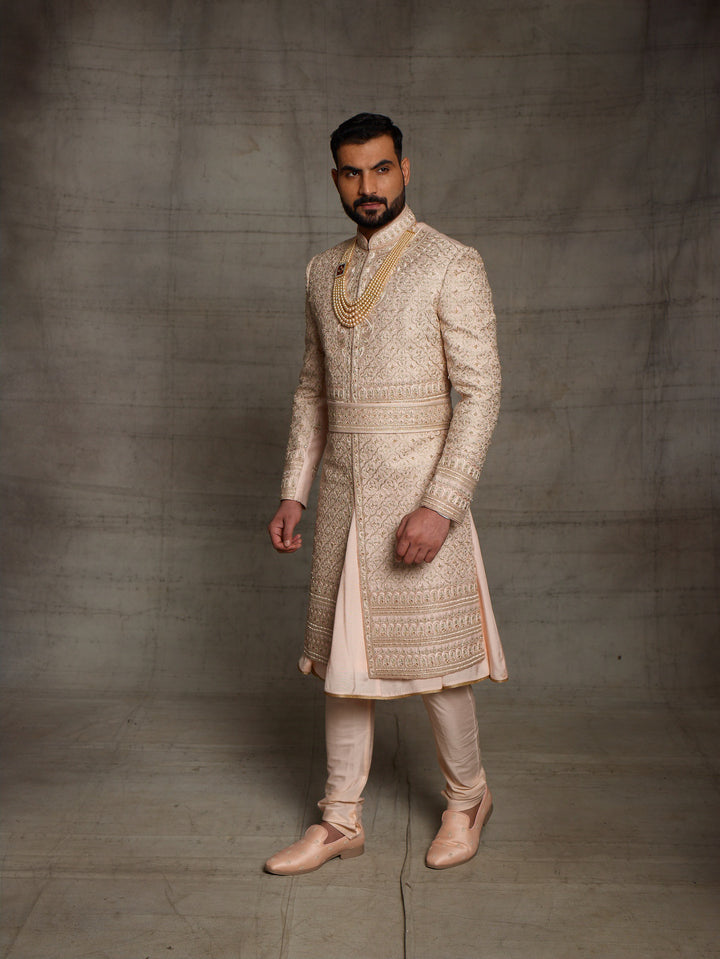 Heavy zardose sherwani with matching kamarbandh.