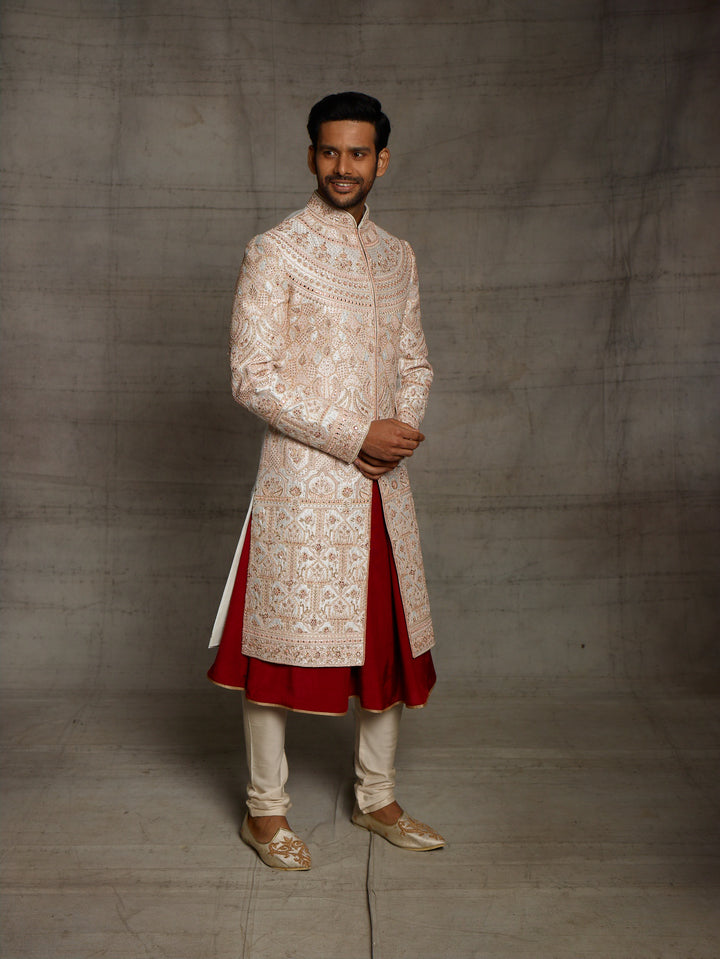 Off-white sherwani with rose gold thread embroidery