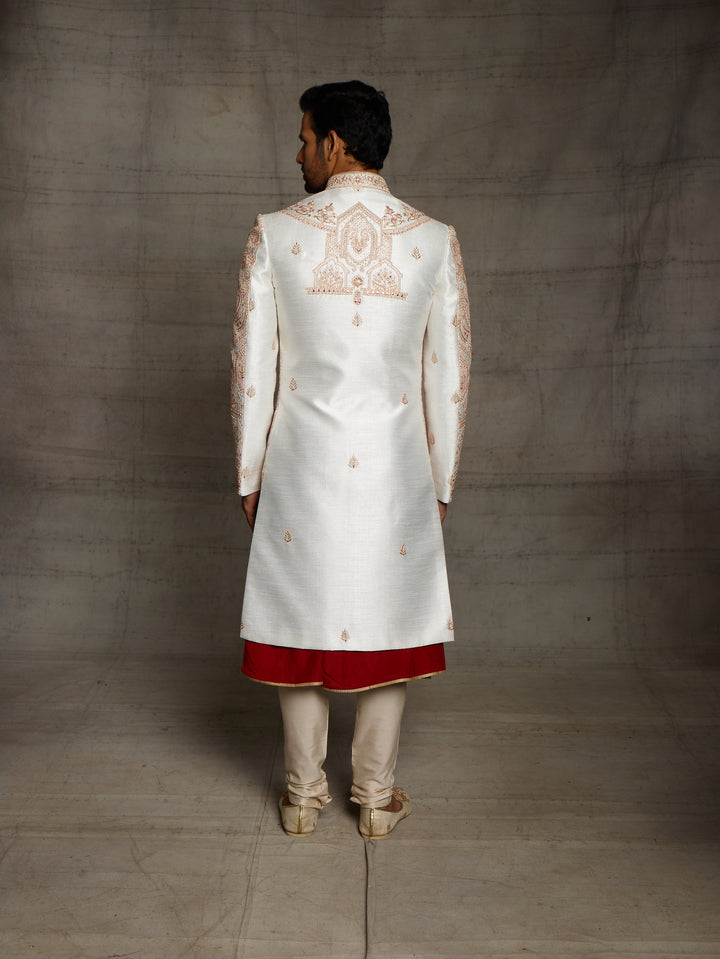 Off-white sherwani with rose gold thread embroidery