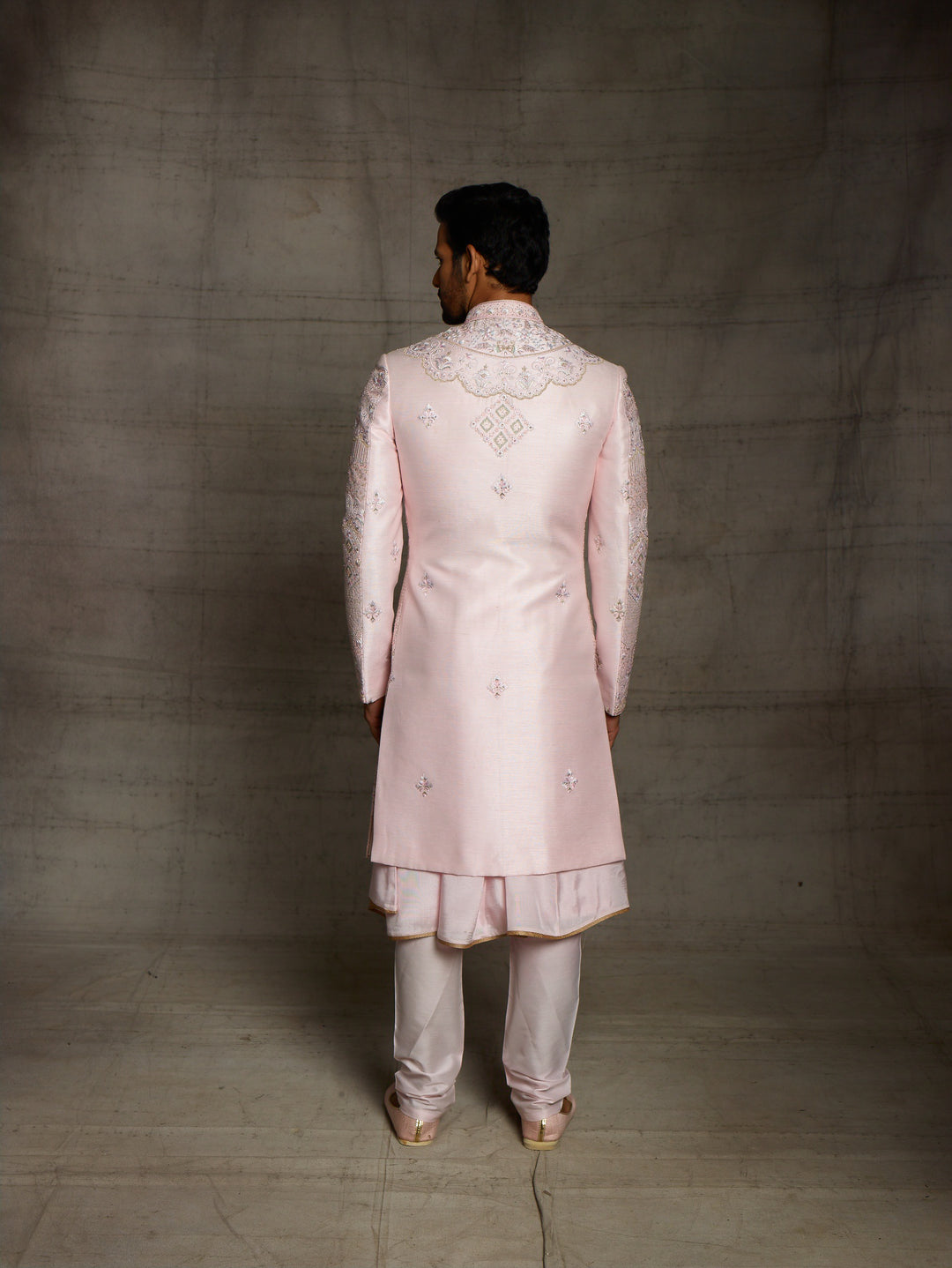 groom's wear sherwani in pink