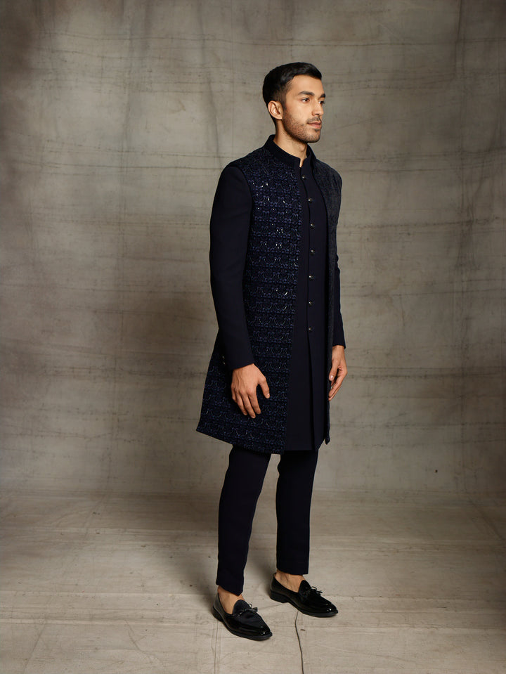 Blue indo-western with front open sleeveless velvet jacket.