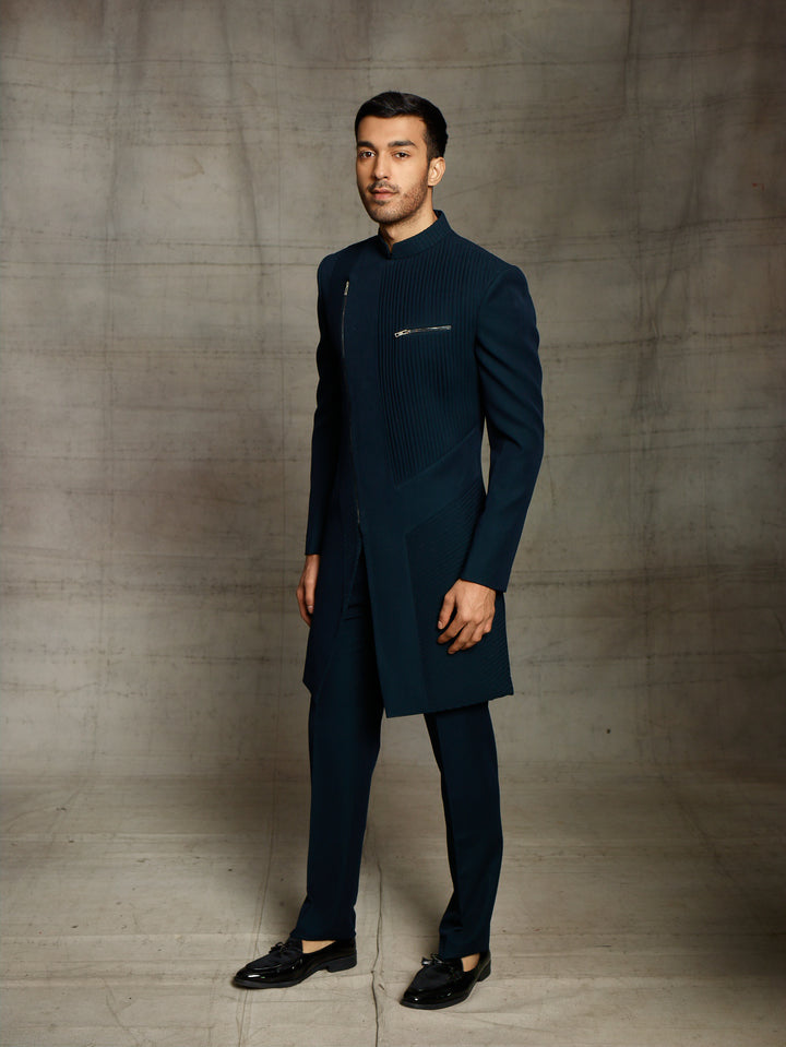 Modern look indo-western in teal green color.