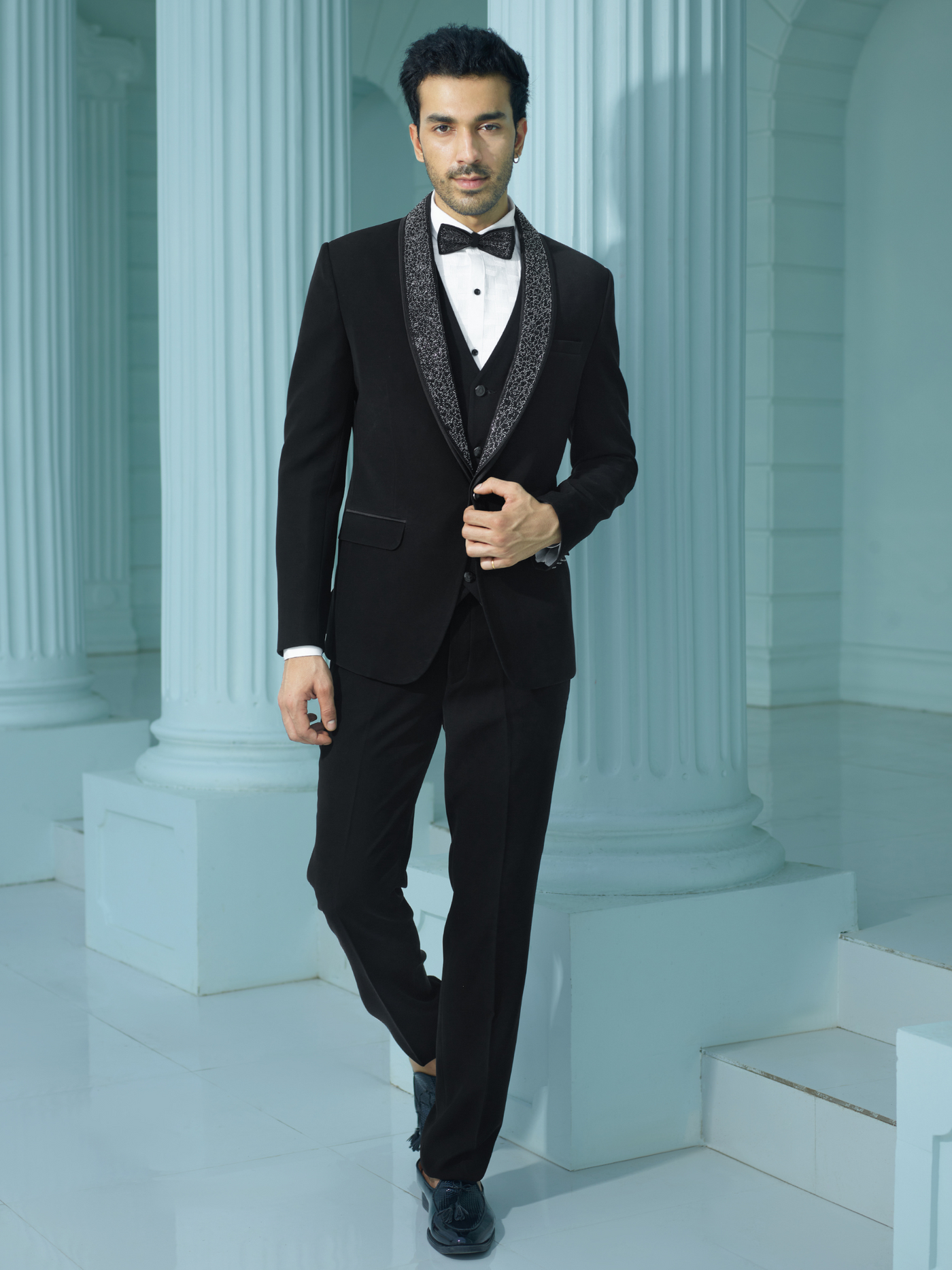 Sleek Black Suit with Embellished Lapel