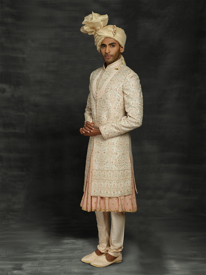 Peach sherwani from groom