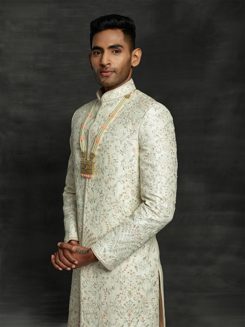 off-white sherwani from groom