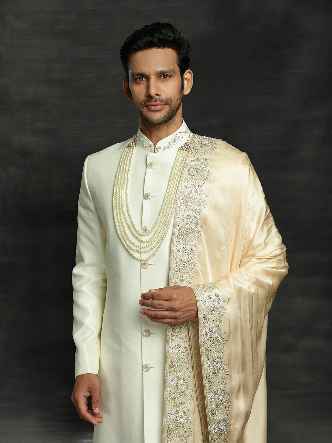 Off white sherwani with gold dupatta