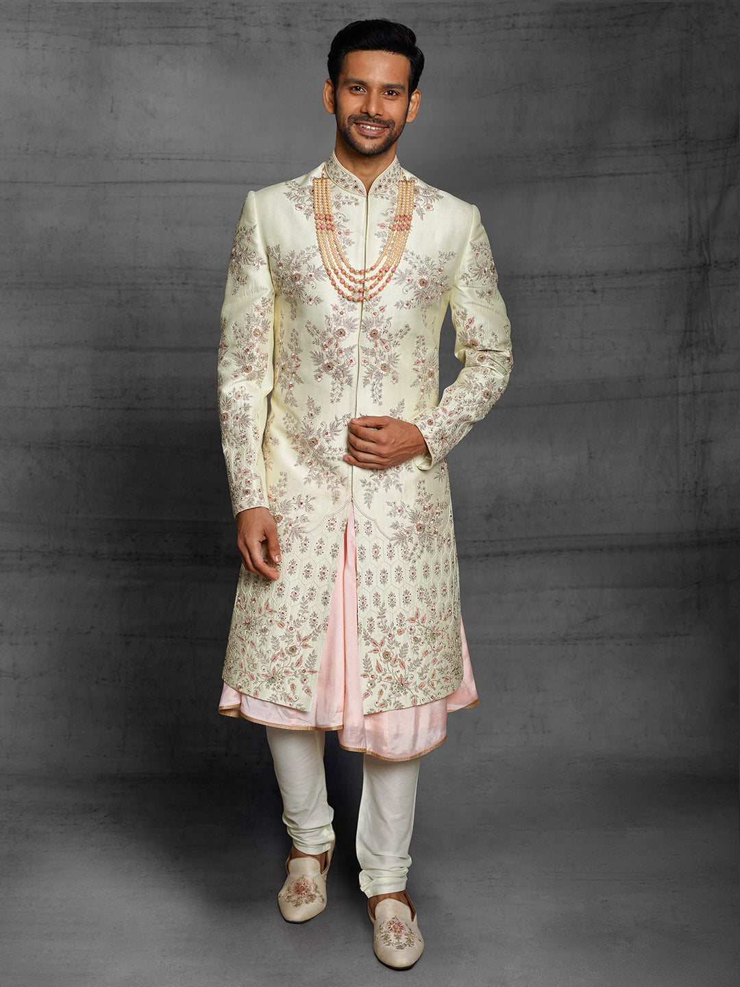 Gold sherwani with floral symmetry design