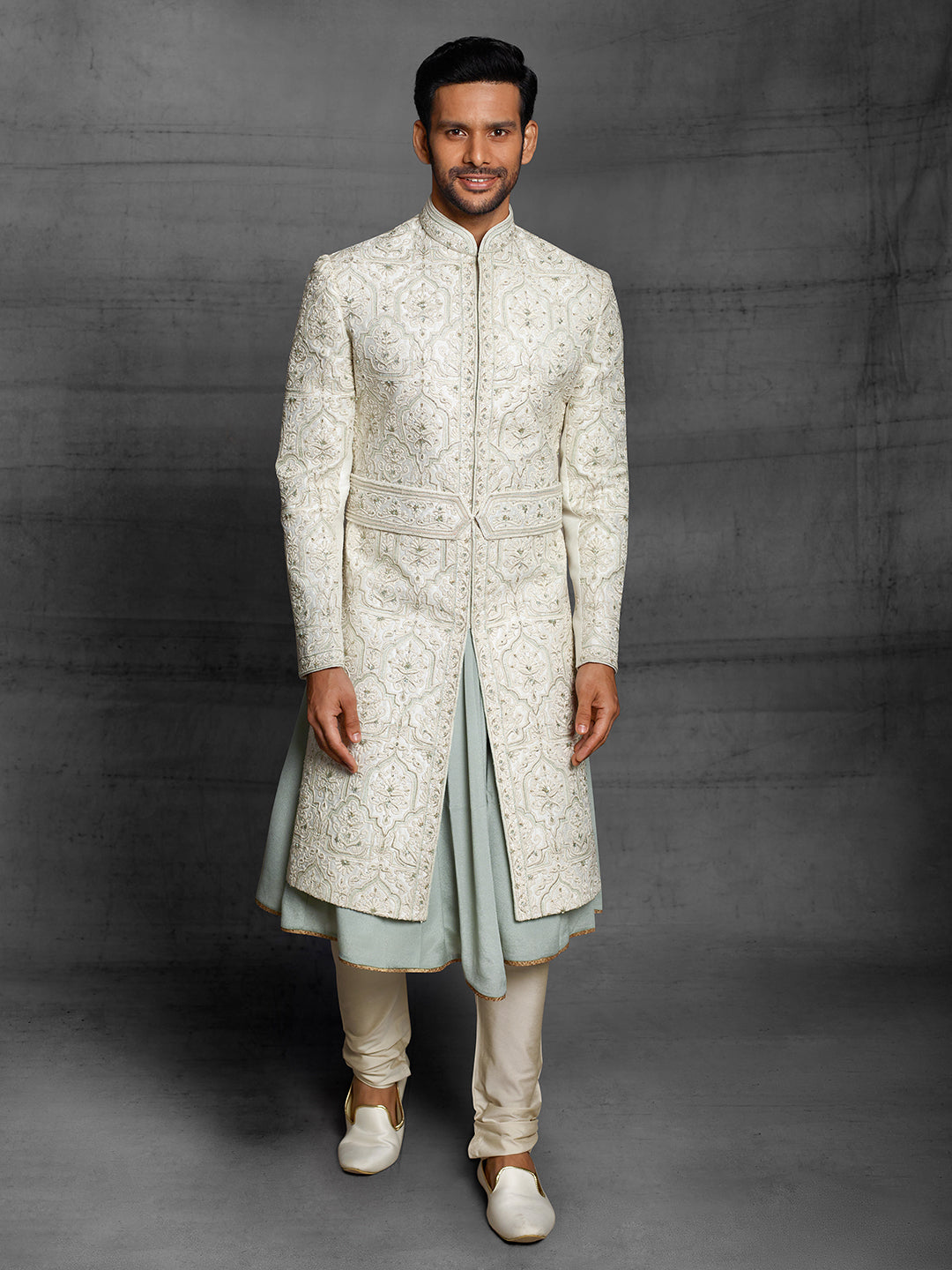 Ivory and mint green combination embossed sherwani with kamarbandh.