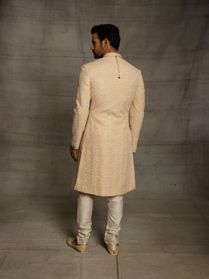Simple sherwani in gold color