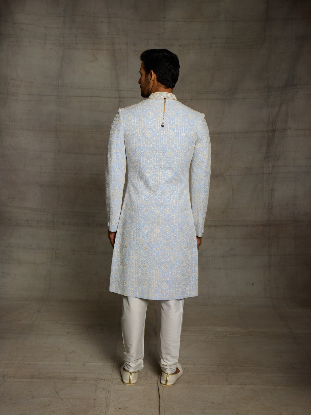 Light blue lakhnavi sherwani.