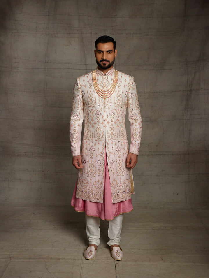 Pink-cream ombre grooms wear sherwani.