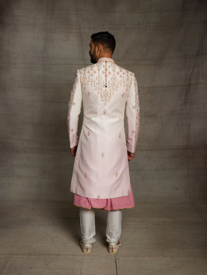 Pink-cream ombre grooms wear sherwani.